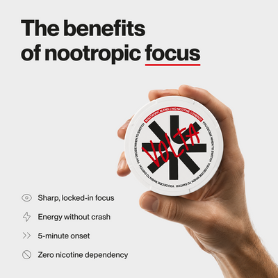 VOLTA 02 motivation pouch lifestyle — nicotine-free dopamine supplement held in hand